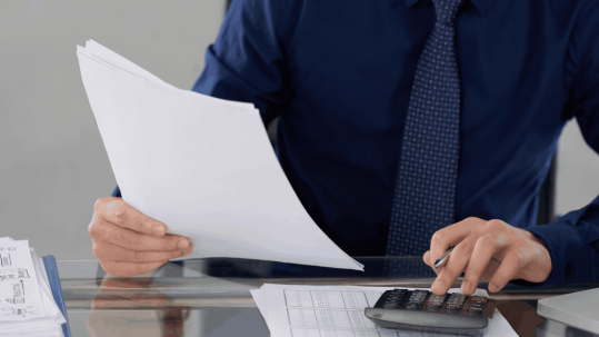 man-calculating-financial-data 1200 x 627